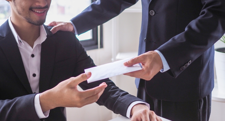 HR consultant meeting remotely with business owner to review telework policies